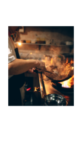 Hands of a chef cooking